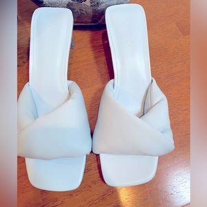 Open Edit baby blue sandals with clear heel.